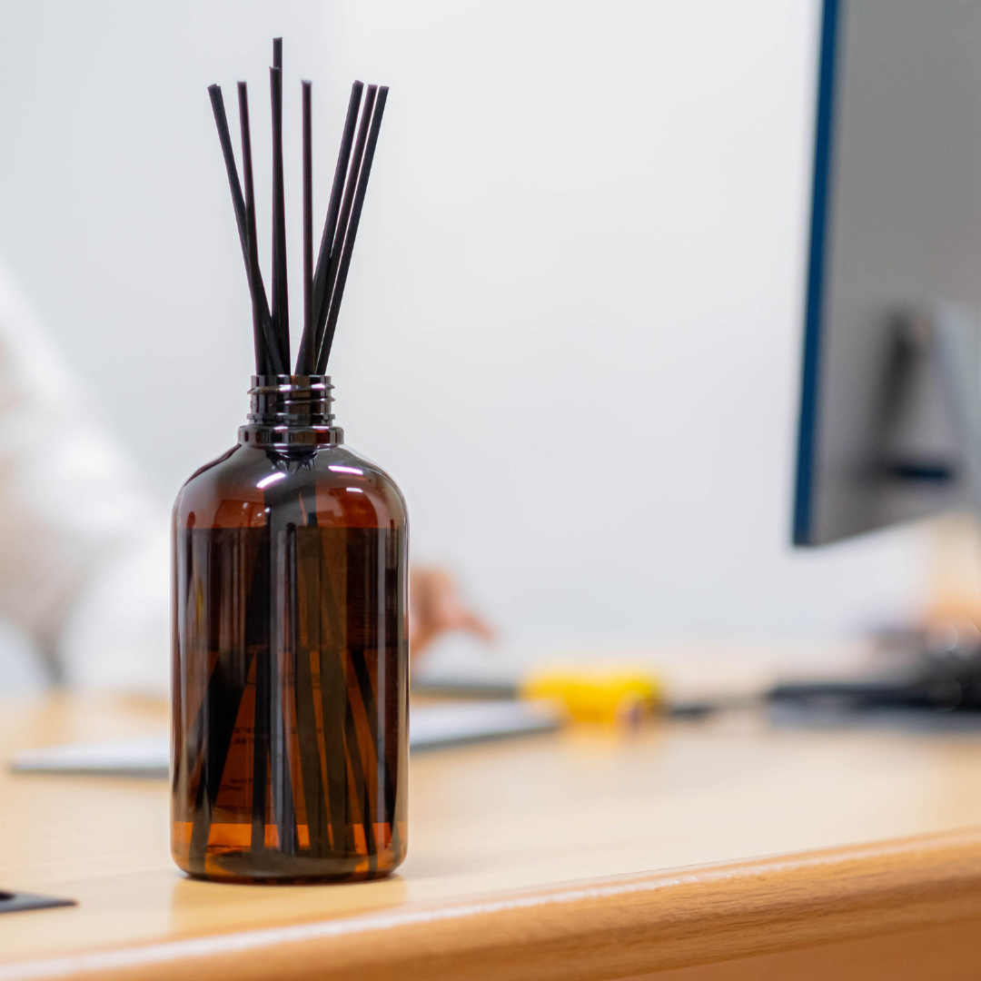 Reed diffuser on a wooden table