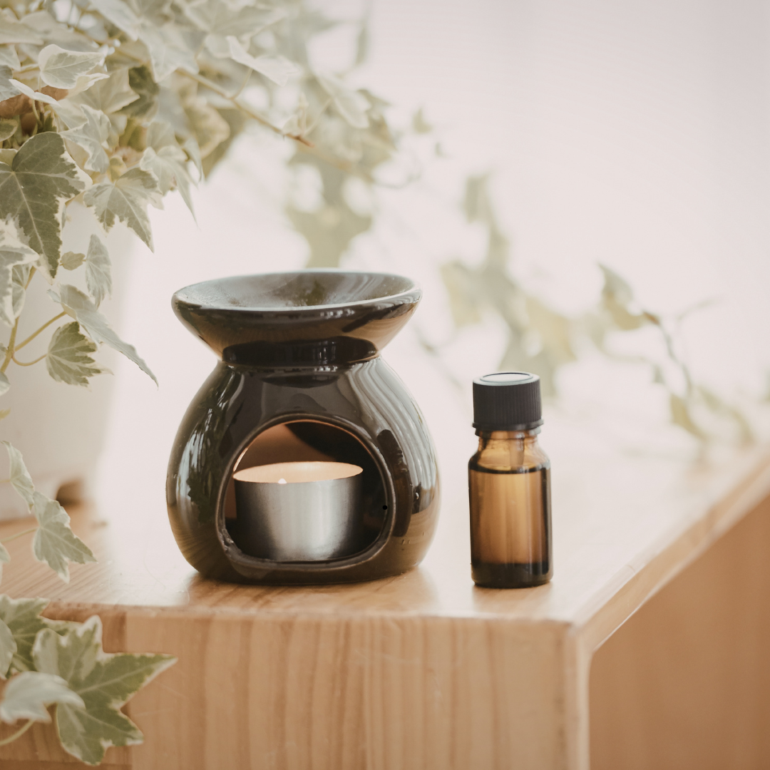 Wax melter and essential oil