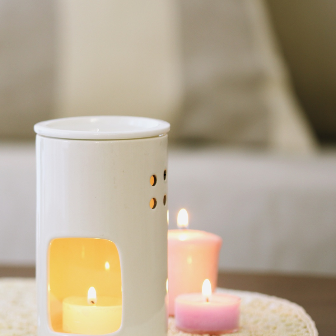 Wax melter with tea lights in the background