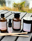 Collection of Angus & Florrie products on a wooden surface with a natural background