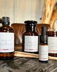 Collection of Angus & Florrie products on a wooden surface with a blurred background
