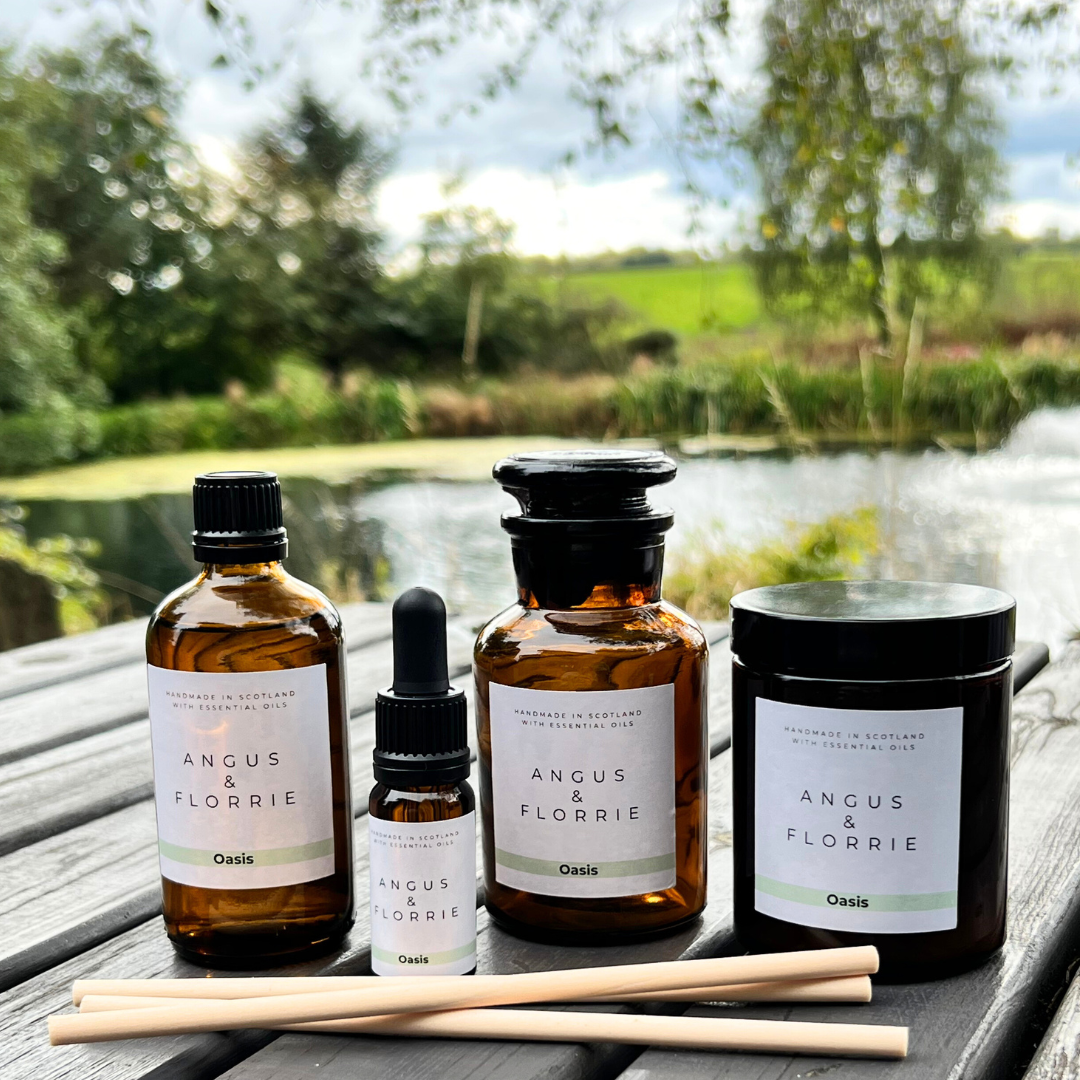 Four Angus & Florrie products on a wooden surface with a natural background