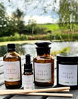 Four Angus & Florrie products on a wooden surface with a natural background
